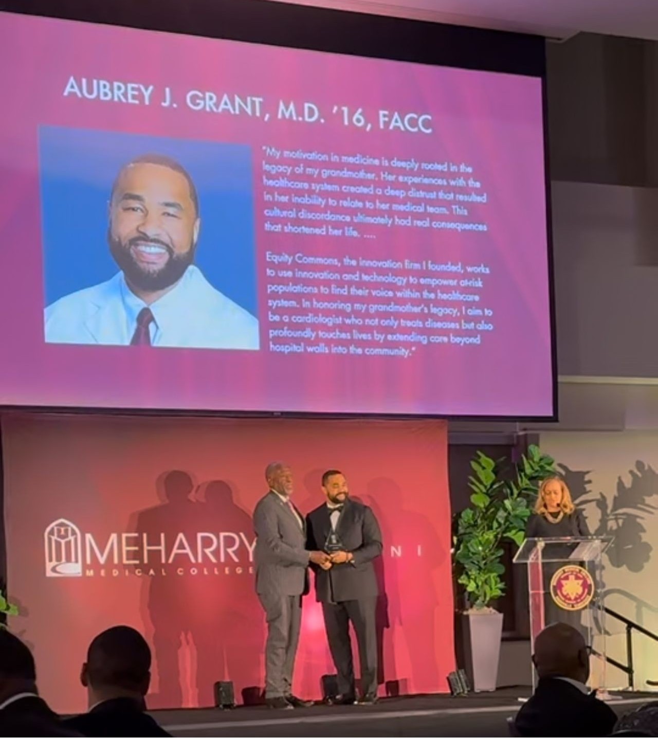 Dr. Aubrey J. Grant onstage at Meharry Medical College receiving 10 Under 10 Award
