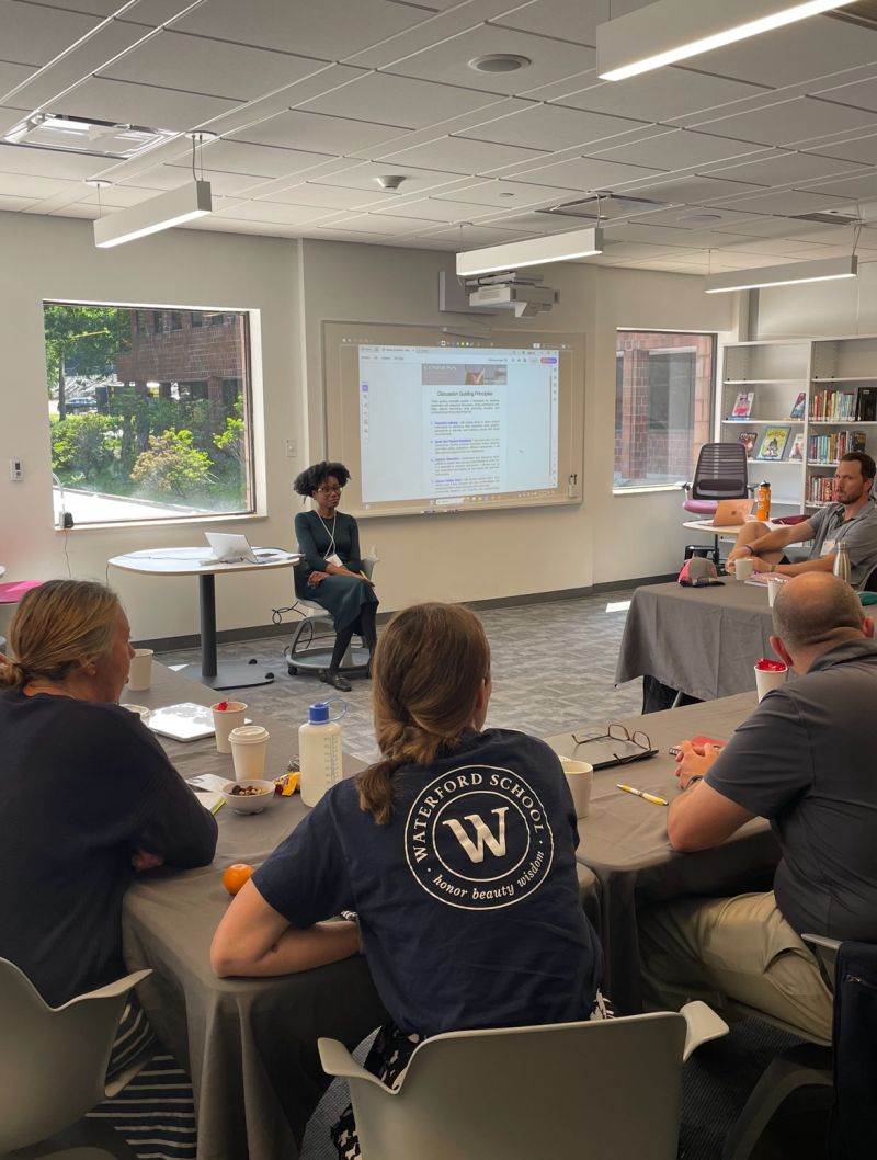 Equity Commons CEO, Whitney A. White, presents to a room of attendees at The Dean's Roundtable Conference